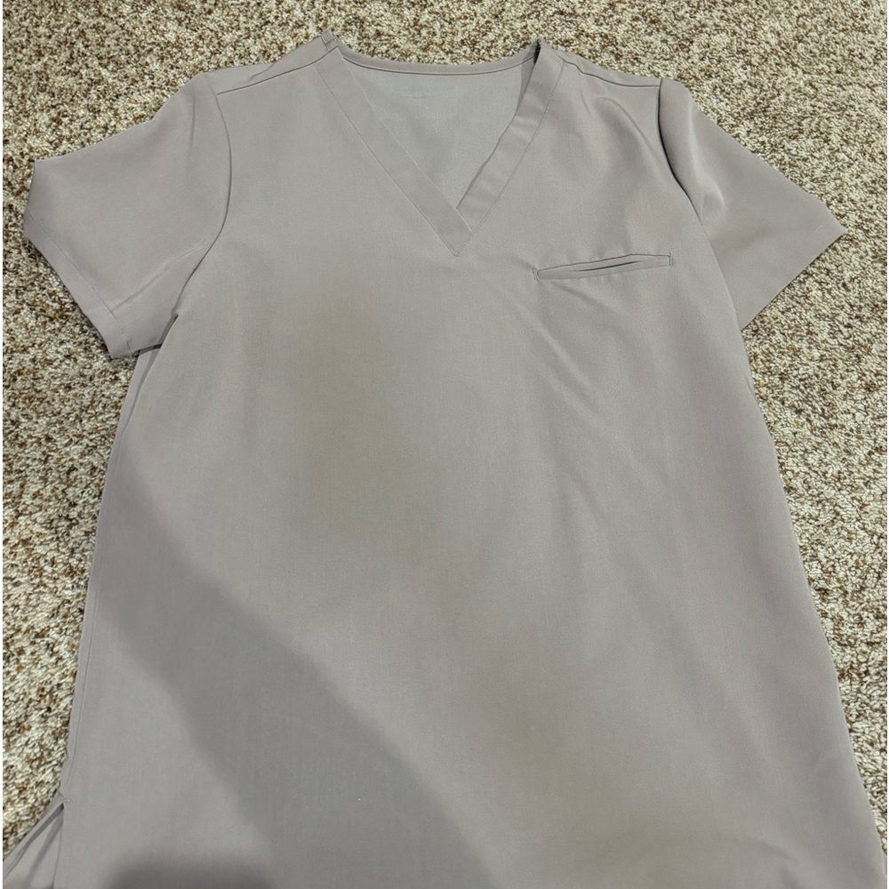 Never been worn set of mocha mandala scrubs.